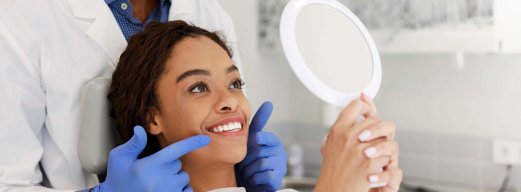 woman getting smile makeover consultation at Moore Smiles